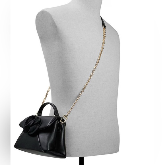 Elegant Black Handbag with Floral Accent - Picture 3 of 12